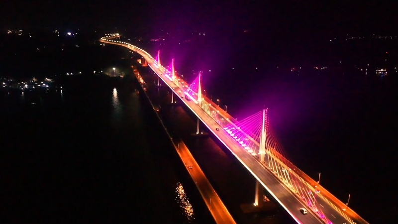 Aerial View of The Atal Setu Bridge in Goa Illuminated with Vibrant Pink Lights at Night