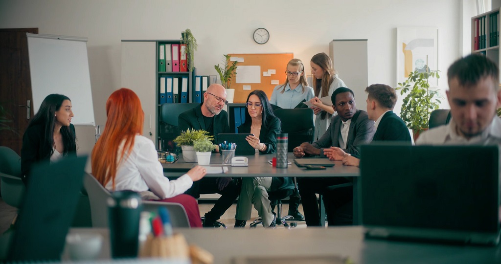 HR professionals working on a localized hiring and HR strategy