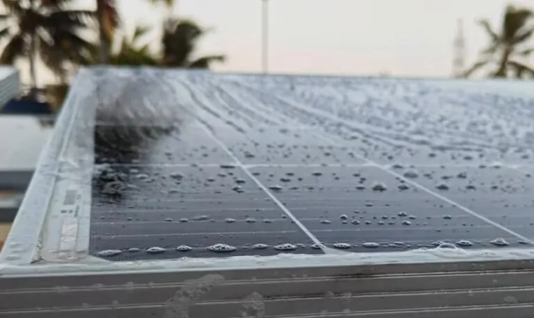 Clean solar panels, glistening with water droplets