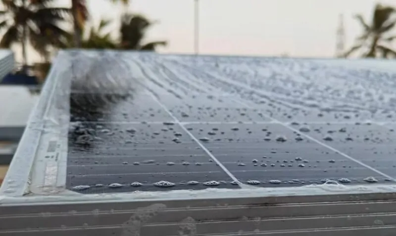 Clean solar panels, glistening with water droplets