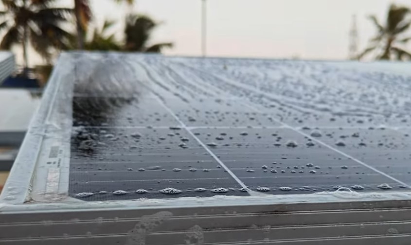 Clean solar panels, glistening with water droplets