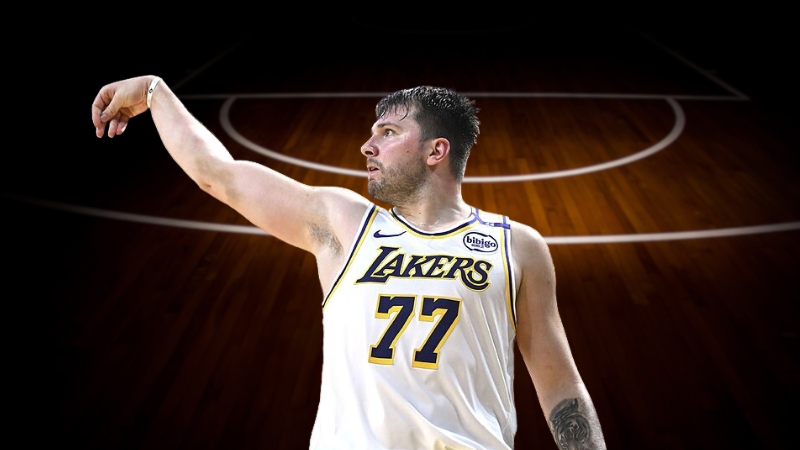 Luka Dončić in a Lakers jersey follows through on a shot after being cleared to return to practice