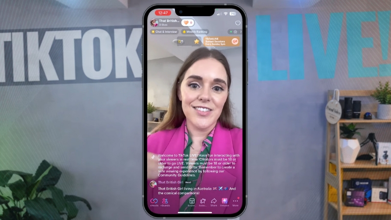 A woman hosts a TikTok Live session, engaging with viewers through interactive on-screen features