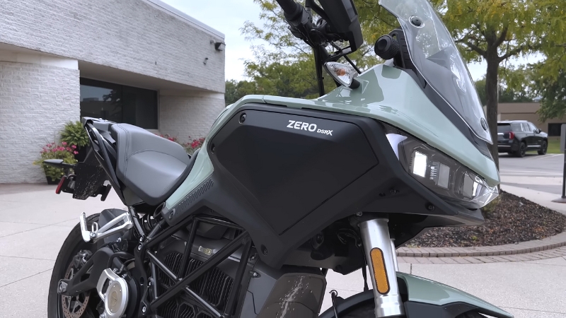 Zero DSR/X electric motorcycle parked outside a building