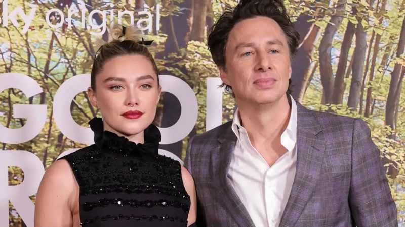 Florence Pugh and Zach Braff pose together at a red carpet event