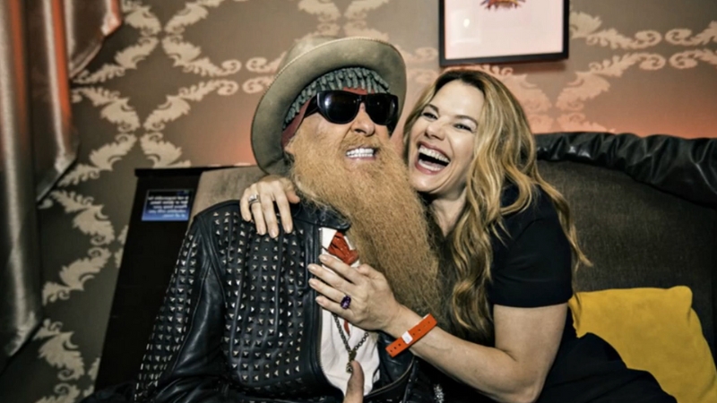Gilligan Stillwater laughing beside Billy Gibbons