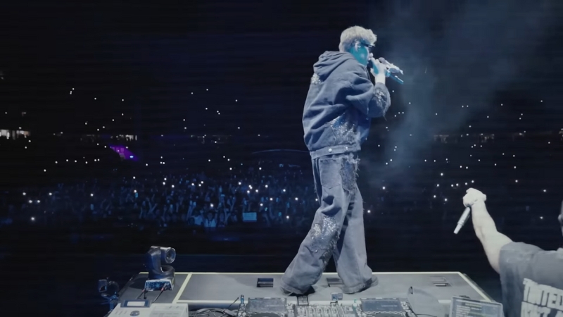 Kid Laroi performs on stage before a massive crowd