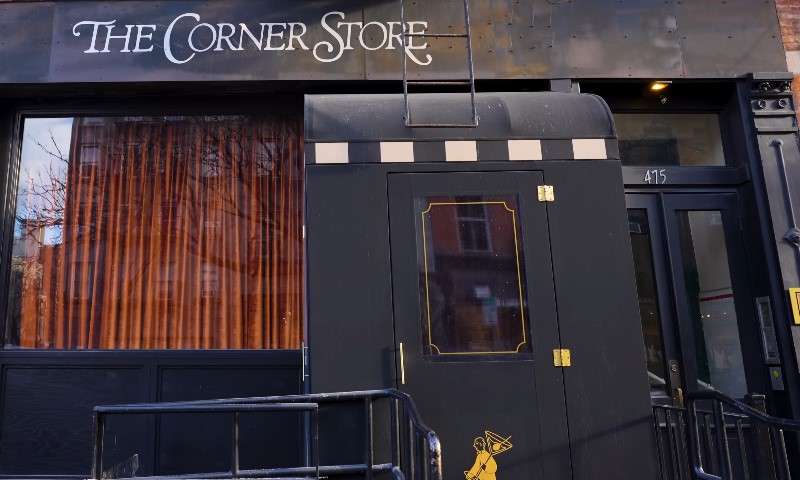 Corner store in Soho, featuring a colorful storefront