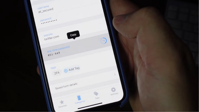 Password manager screen shows a one-time code option while settin up two factor authentication
