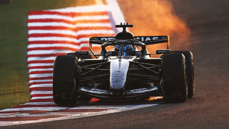 Formula 1 car on track at high speed during a race weekend session