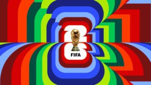 Official FIFA trophy displayed over a colorful backdrop promoting the 2026 World Cup