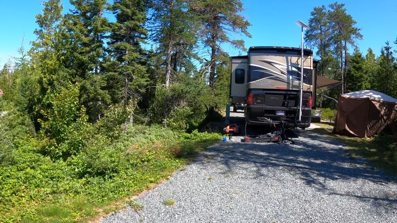 RV campsite at Schoodic Woods Campground in Acadia National Park surrounded by forest