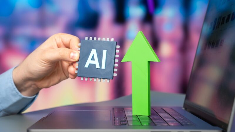 Laptop screen shows an algorithm example during AI product development work