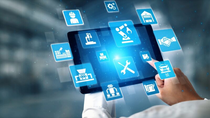 Person uses a tablet interface with AI icons for automation and product workflows